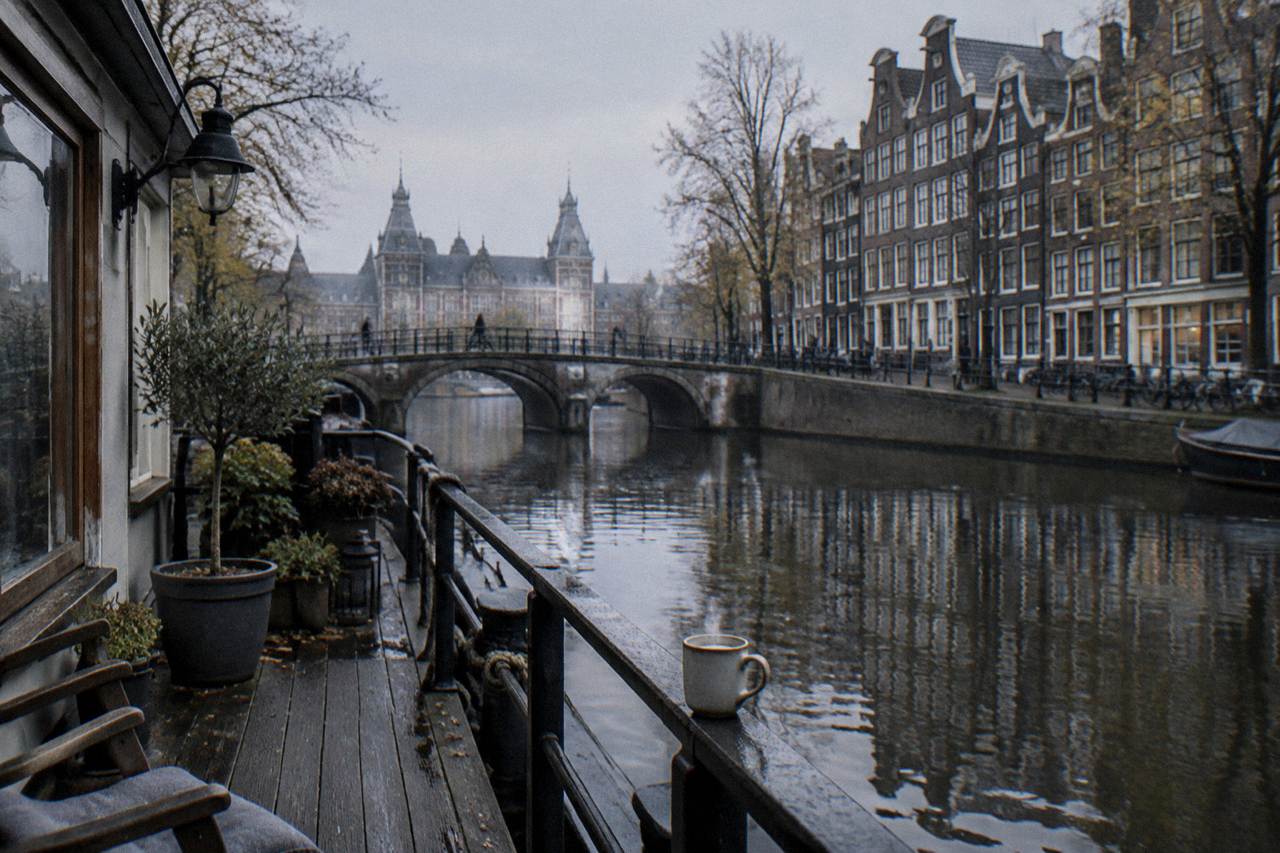 Canal houses and a bridge in Amsterdam on a quiet grey morning